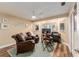 Bright office space featuring water views, comfortable seating, and neutral tones at 16011 Acorn Cir, Tavares, FL 32778