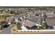 Aerial view of the property, showcasing the neighborhood and screen enclosed lanai at 1781 Kingfisher Ct, The Villages, FL 32162