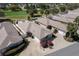 Aerial view of the home showcasing the meticulous landscaping and well-maintained surroundings, golf course adjacent at 1802 Dalton Dr, The Villages, FL 32162