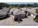 Aerial view of the home showcasing the meticulous landscaping and well-maintained surroundings with golf course at 1802 Dalton Dr, The Villages, FL 32162