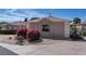 Charming single-story home featuring a well-maintained landscape, neutral exterior, and a lovely bay window at 1802 Dalton Dr, The Villages, FL 32162