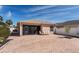 Brick patio with outdoor seating that is shaded by a screened lanai at 1802 Dalton Dr, The Villages, FL 32162