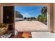 Covered patio with brick flooring and view of the community's greenery at 1802 Dalton Dr, The Villages, FL 32162