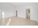 Spacious, bright bedroom with tile flooring and two entry doors at 2046 Dalecroft Trl, The Villages, FL 32162