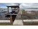 Lake view from the boat dock and boat house at 22 Big Tree Dr, Fruitland Park, FL 34731