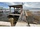 Lake view from the boat dock and boat house at 22 Big Tree Dr, Fruitland Park, FL 34731