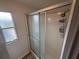 Shower with built-in shelves at 22 Big Tree Dr, Fruitland Park, FL 34731