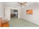 View from bedroom featuring neutral walls, and green carpet at 3009 Batally Ct, The Villages, FL 32162