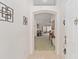 View of the home's foyer leading into a spacious living area with stylish decor and ample natural light at 3009 Batally Ct, The Villages, FL 32162