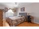 Cozy bedroom with a window at 3056 Saint Thomas Ln, The Villages, FL 32162