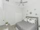 Bedroom with a comfortable bed, stylish decorations, and ample space at 3435 Tumbling River Dr, Clermont, FL 34711