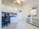 This is the office featuring custom cabinets, counter tops, drawers, and a rolling office chair at 3720 Eversholt St, Clermont, FL 34711