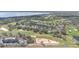 Aerial view of the residential community and golf course at 4256 Fawn Meadows Cir, Clermont, FL 34711