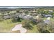 Scenic community with well-maintained homes, golf course and a lake at 4256 Fawn Meadows Cir, Clermont, FL 34711