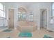 Well-appointed bathroom with separate shower and tub, offering a relaxing retreat at 4256 Fawn Meadows Cir, Clermont, FL 34711