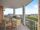 Relaxing balcony with outdoor seating and stunning harbor views at 4620 Riverwalk Village Ct # 7505, Ponce Inlet, FL 32127