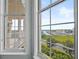 Stunning marina view from large windows with a glimpse of a balcony to the left at 4620 Riverwalk Village Ct # 7505, Ponce Inlet, FL 32127