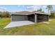 Aerial view of the back of the home highlighting the screened porch and patio area in a fenced backyard at 5890 Sw 167Th Pl, Ocala, FL 34473