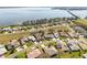 Beautiful aerial view of waterfront homes and community near a body of water at 6342 Sailboat Ave, Tavares, FL 32778