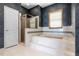 Bathroom featuring a shower, jacuzzi tub, and natural lighting at 10944 Autumn Ln, Clermont, FL 34711