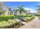 Inviting street view featuring beautifully landscaped homes and a serene walking path at 11090 Silver Surfer Aly, Winter Garden, FL 34787