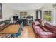 Functional home office with a desk, chair, shelving, and natural light, offering a productive workspace at 1236 Selman Rd, Leesburg, FL 34748