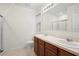 Bathroom features a double sink vanity with ample counter space at 125 Sunny Day Way, Davenport, FL 33897