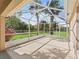 Lovely screened patio with backyard views, lots of natural light and room to relax at 164 Palermo Pl, The Villages, FL 32159