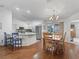 Bright kitchen featuring modern appliances, ample counter space, and stylish white cabinetry at 17442 Se 79Th Lovewood Ave, The Villages, FL 32162