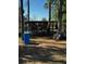 Rustic outdoor shelter with metal cage around it and mature trees around it at 18316 Keene Rd, Altoona, FL 32702