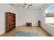 A room with neutral walls, tile flooring, natural light, and closet space at 1841 Dunn Cove Dr, Apopka, FL 32703