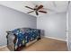 Minimalist bedroom featuring a ceiling fan at 1917 Emily Blvd, Winter Haven, FL 33884