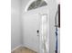 Bright entryway with a white door and a window at 1917 Emily Blvd, Winter Haven, FL 33884