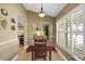 Inviting dining room showcasing ample natural light and an open layout perfect for Gathering gatherings at 2165 Smoaks St, The Villages, FL 32162