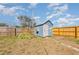 Shot of backyard with shed and playset at 2803 Joleen Dr, Eustis, FL 32726