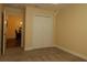 Bedroom with neutral walls, carpet, and closet at 3290 Sennett Cir, Oxford, FL 34484