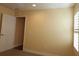 Bedroom featuring wood-style blinds and neutral walls at 3290 Sennett Cir, Oxford, FL 34484