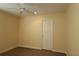 Bedroom featuring a ceiling fan and neutral walls at 3290 Sennett Cir, Oxford, FL 34484