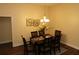 Elegant dining room featuring a stylish table setting and modern lighting, perfect for entertaining at 3290 Sennett Cir, Oxford, FL 34484