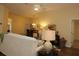 Open-concept living room offering a glimpse into the dining area, with a comfortable couch at 3290 Sennett Cir, Oxford, FL 34484