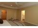 Neutral-toned main bedroom with access to a walk-in closet and bathroom at 3290 Sennett Cir, Oxford, FL 34484