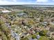 Community aerial shot with neighborhood views, showcasing the beautiful lake and surrounding greenery at 3400 Foxboro Ct, Mount Dora, FL 32757