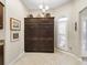 Spacious pantry area with custom built-in shelving and window providing natural light at 3540 O'Brien Pl, The Villages, FL 32163