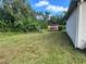 Backyard shot with a metal shed, perfect for extra storage at 390 Colonade Ct, Kissimmee, FL 34758