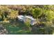 Aerial shot of a home with large yard nestled amongst trees at 39615 Forest Dr, Eustis, FL 32736