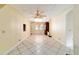 Bright dining area with tile floors and a vintage chandelier at 39615 Forest Dr, Eustis, FL 32736