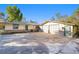 View of a spacious two-car garage with ample driveway parking at 39615 Forest Dr, Eustis, FL 32736