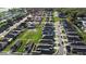 Expansive aerial view of a well-planned community featuring numerous single-Gathering homes and green spaces at 440 Kensington View Dr, Winter Haven, FL 33880