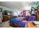 Main bedroom featuring a carpet, wooden bed frame, a tv, and lots of space at 4654 Coppola Dr, Mount Dora, FL 32757