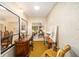 Hallway featuring skylight, desk, and sitting area at 480 Ne 45Th Ter, Ocala, FL 34470